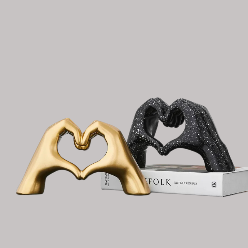 Nordic Creative Heart Gesture Sculpture, crafted with exquisite attention to detail. Features a sleek & minimalist design inspired by Nordic aesthetics. Depicting a heart gesture, it embodies love, connection, & creativity. Made from high-quality materials, for durability & elegance. Smooth contours & clean lines, matte finish. exudes understated charm.-MODERN HOME FASHION