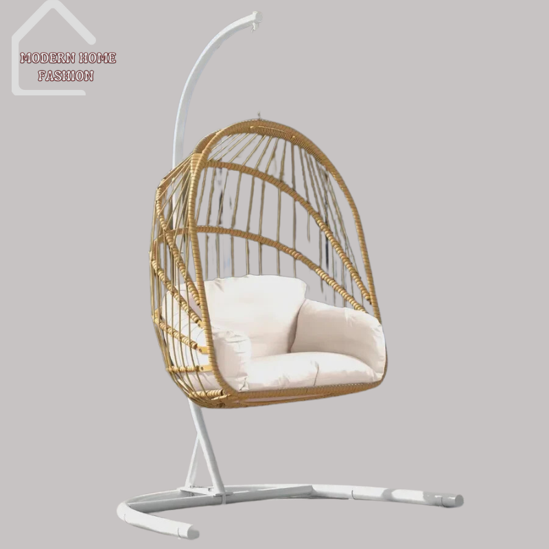 Egg Wicker Swing Chair, crafted from durable wicker material, features a unique egg-shaped design that adds a modern twist to any setting. Comes with plush cushions for added comfort, with sturdy steel frame ensures stability & support, while the hanging design adds a whimsical charm to your decor.-MODERN HOME FASHION
